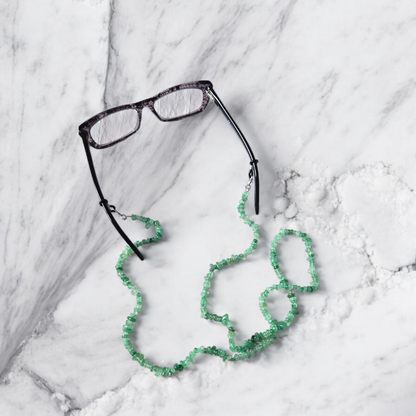 Obsidian Stone Chip Glasses or Mask Lanyard displayed on glasses over a light surface.