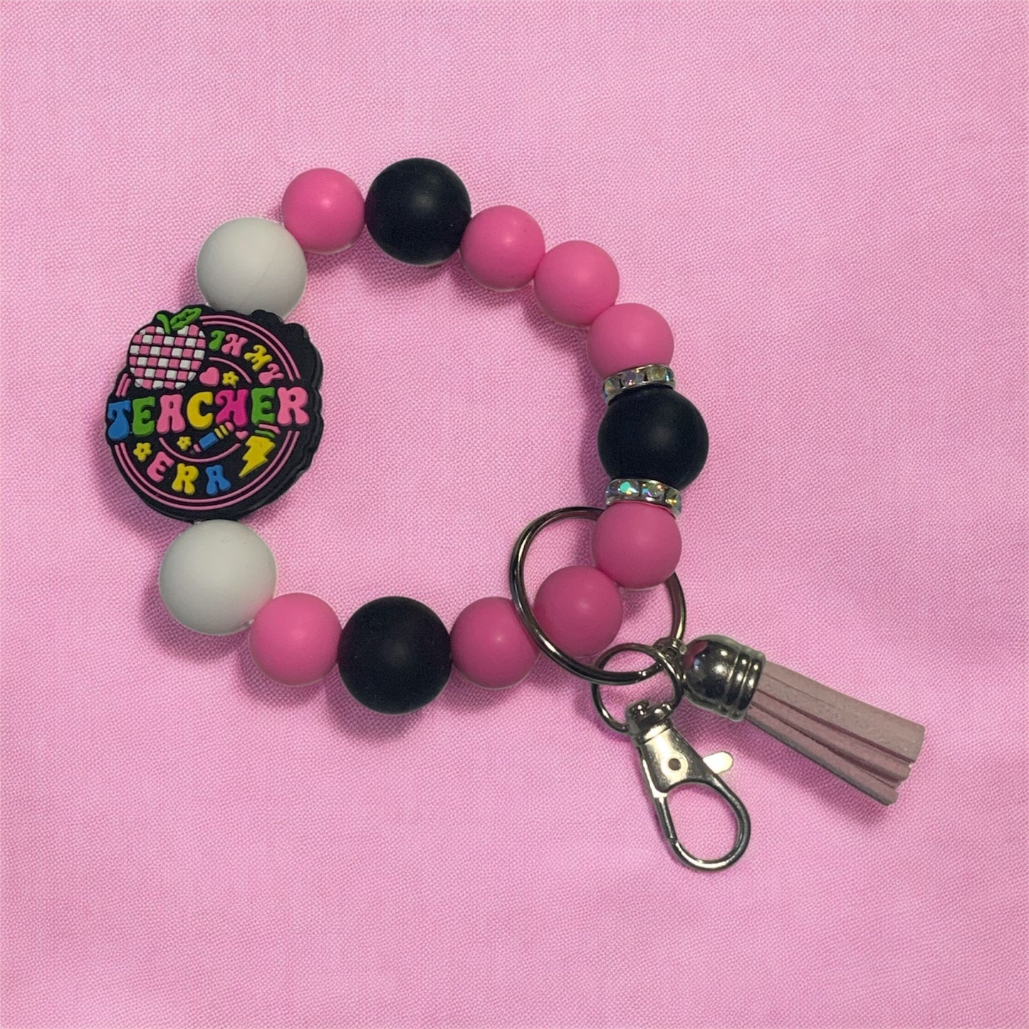 beaded silicone keychain wristlet, featuring a focal bead that says, "In my teacher Era"