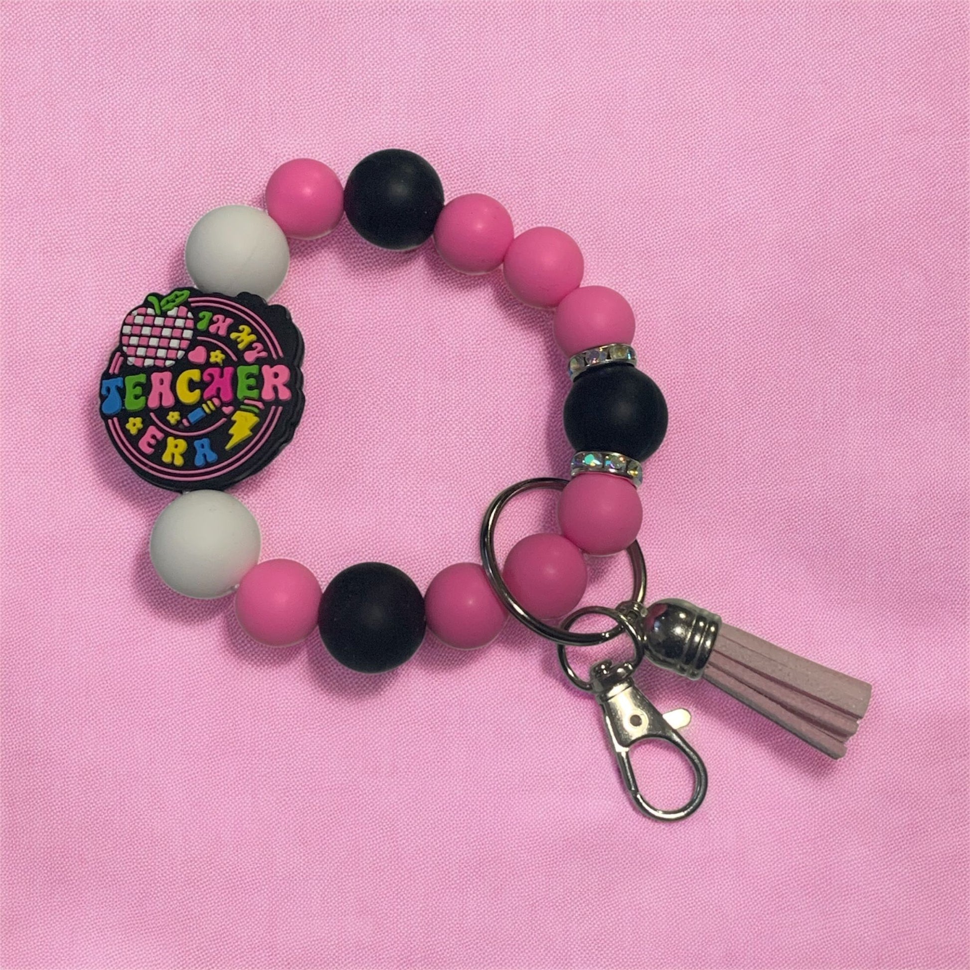 beaded silicone keychain wristlet, featuring a focal bead that says, "In my teacher Era"