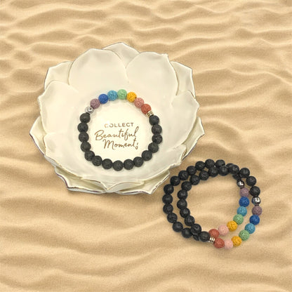 Three reiki lava bed bracelets are pictured with a lotus shaped white bowl with the text, "Collect Beautiful Moments ".