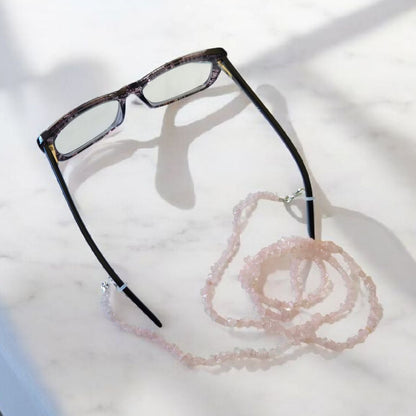 Rose Quartz Stone Chip Glasses or Mask Lanyard on a light surface.