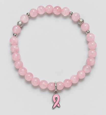 Breast cancer awareness bracelet with pink 6 mm rose quartz beads, stainless steel accents, and a 925 sterling silver charm by Divalicious Designs.